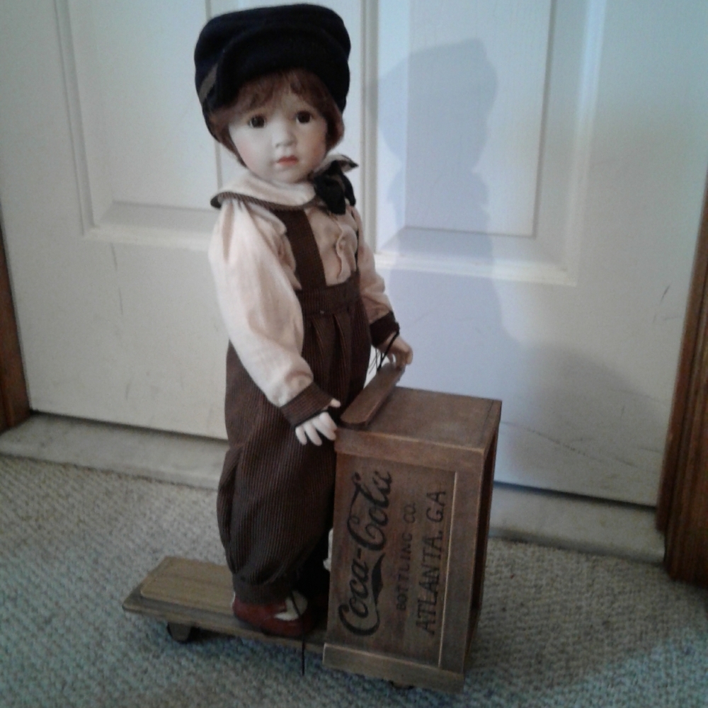 Coca cola boy and scooter